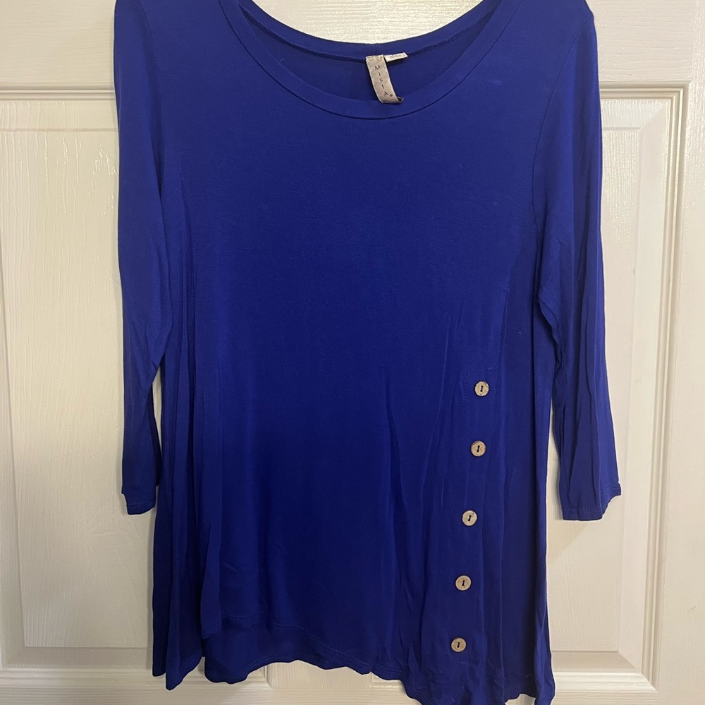 Tunic type top in perfect condition